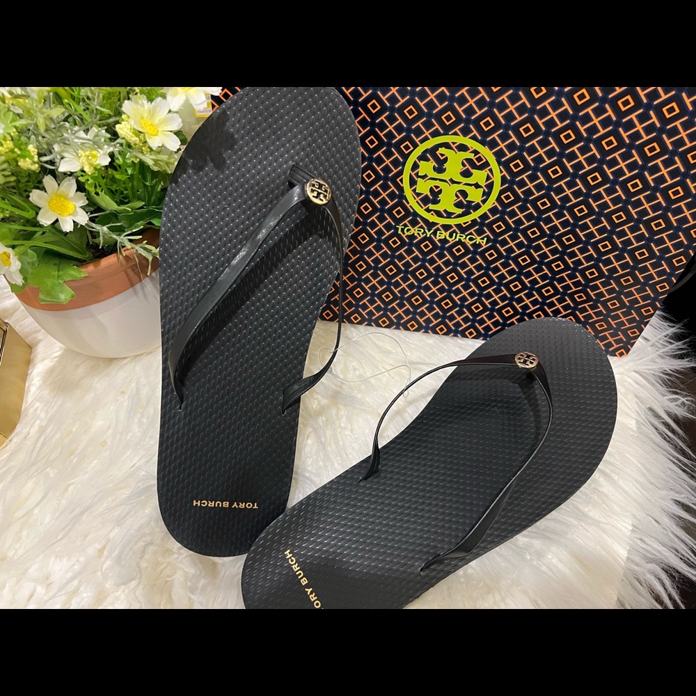 Tory Burch platform flip flops- brand new, never worn and with bag.